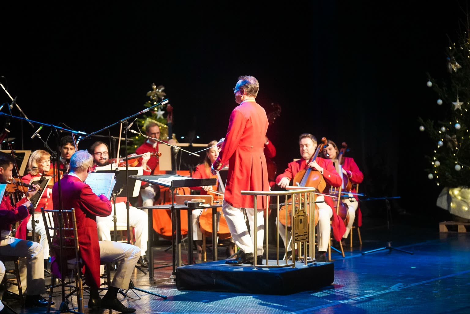 Conductor leading the Strauss Capelle Vienna orchestra on stage in Sofia