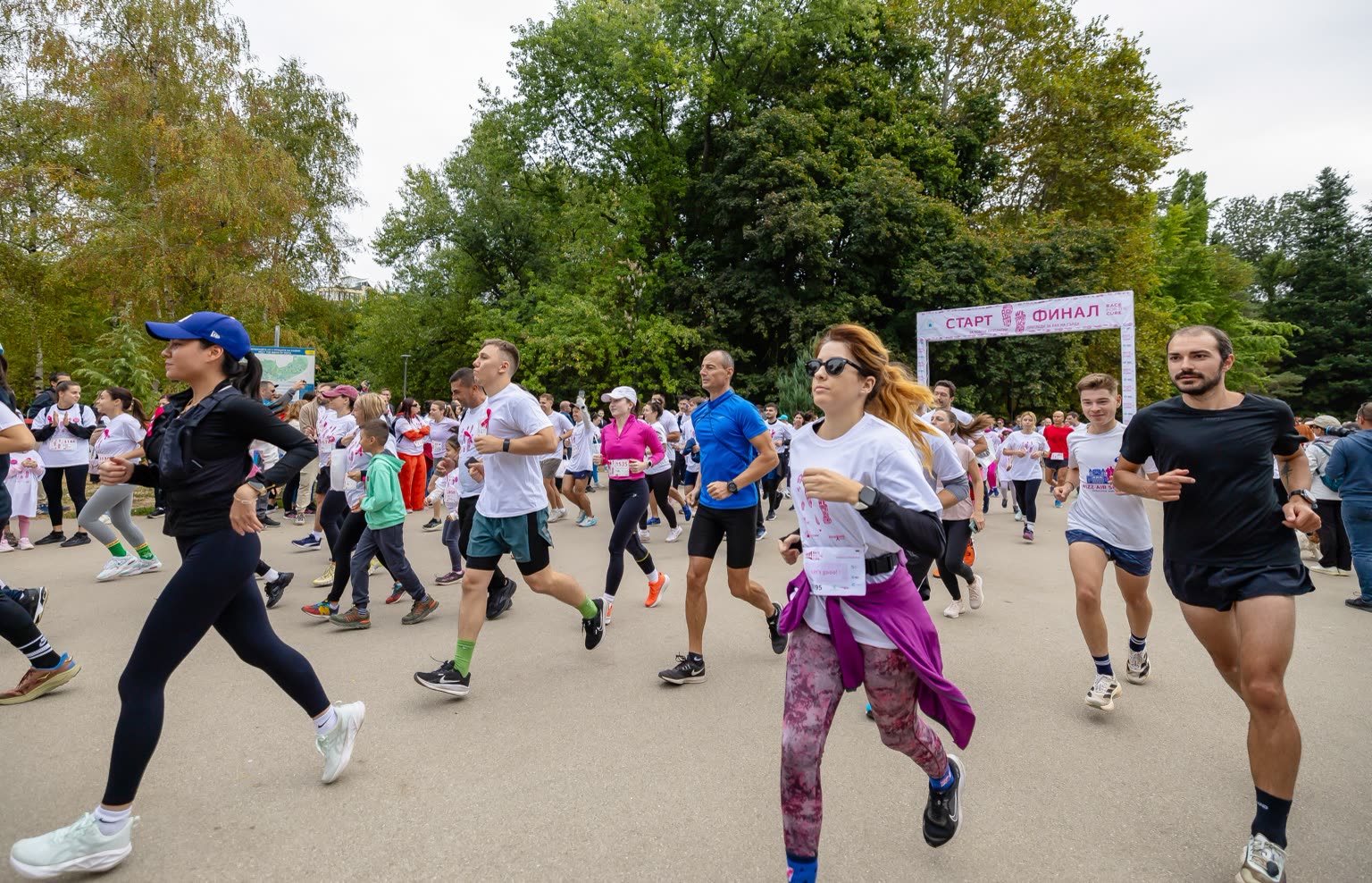 Race for the Cure Bulgaria participants running through a Sofia park